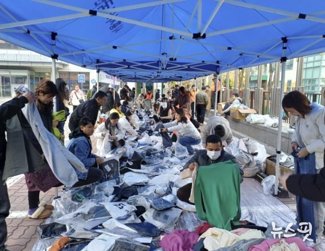시흥시외국인복지센터 사랑이 담긴 손길, 겨울철 외국인 주민 의류 나눔 행사 진행